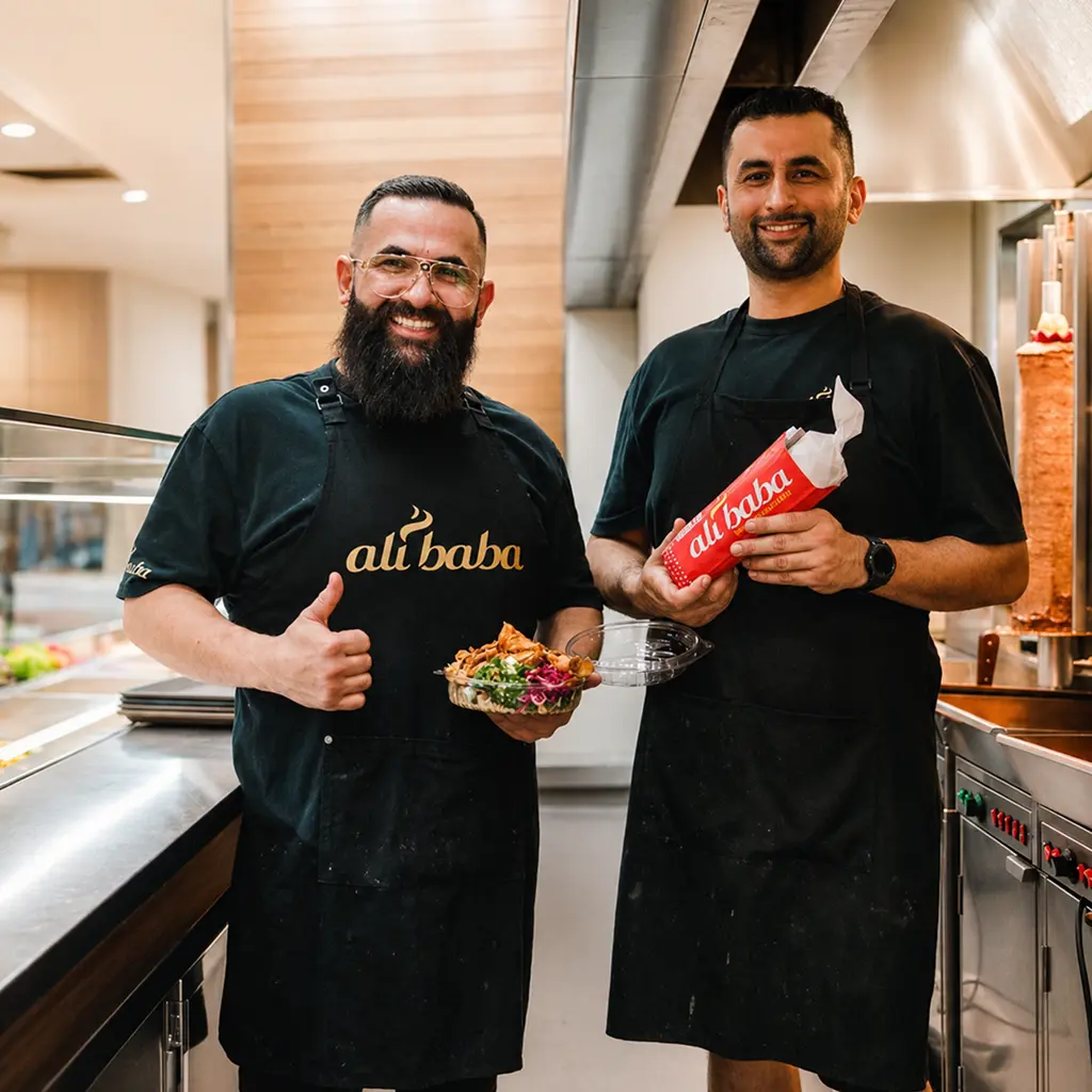 Two Ali Baba store owners
